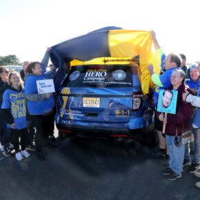 Prior to the start of the 2023 HERO Walk on Sunday, October 15, 2023, the HERO Campaign unveiled a new Stockton University HERO-wrapped patrol vehicle in memory of Kevin Ade, a Stockton student who was killed by a drunk driver in 2007. Ade’s family members are pictured removing the cover from the vehicle, revealing the HERO Campaign logo and decal tribute to Ade.